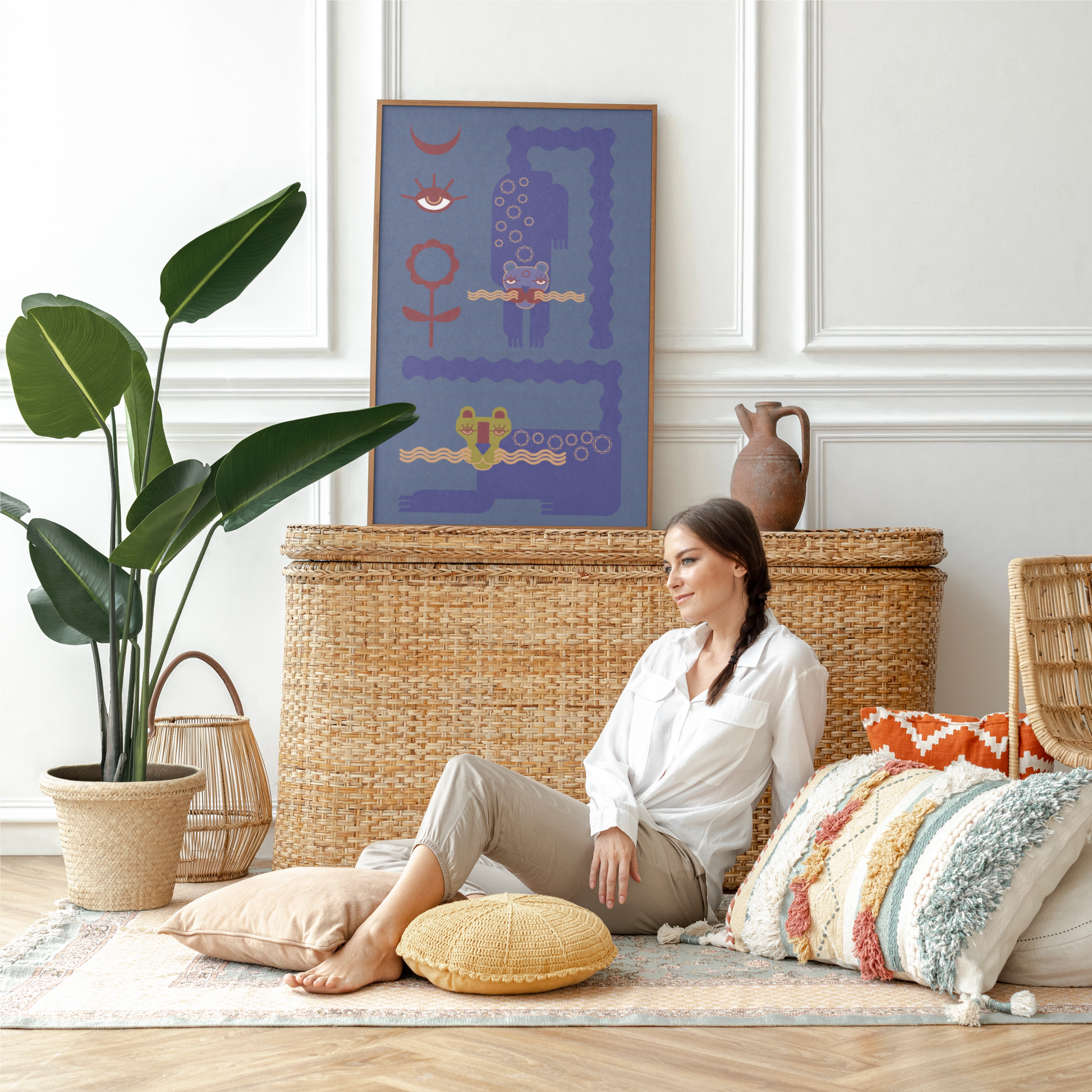 framed-magical-snowcats-fine-art-print-seek-and-find-mystical-animal-wall-art-gail-evenden-with-Woman-sitting-on-a-rug-in-a-living-room